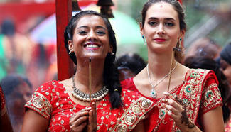 Women offer prayers during Teej festival in Kathmandu