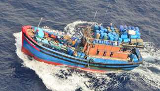 Australian officers prepare to board illegal foreign fishing vessel