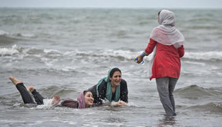Iranians have fun at Caspian sea beach