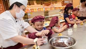 Moon cake making events for children organized ahead of Mid-Autumn Festival