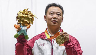 China's Dong defends Paralympic 10m air rifle SH1 title