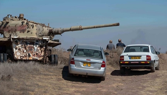 Syrian army, rebels exchange fire near Israeli-Syrian border