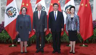 President Xi Jinping meets Peru's Pedro Pablo Kuczynski