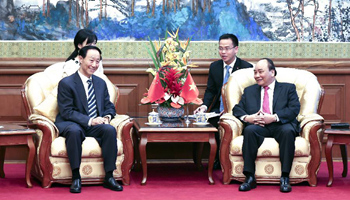 Vice chairman of CPPCC National Committee meets Vietnamese PM in Beijing