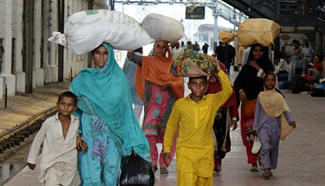 People return from hometowns after Eid al-Adha festival in Pakistan