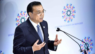 Chinese Premier pledges financial aid for refugees