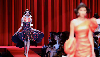 Creations presented at Moschino fashion show in Milan