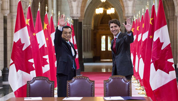 Spotlight: China, Canada agree to strengthen economic, trade ties
