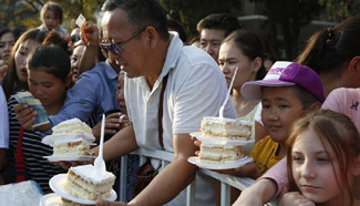 People buy cakes to raise money for charity in Bishkek, Kyrgyzstan