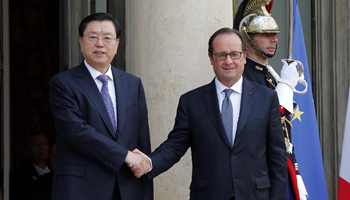 Chinese, French leaders vow to boost ties, cooperation