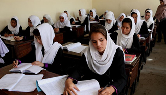 Afghan girl students attend class at Surya High School in Kabul