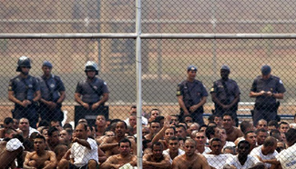About 100 prisoners recaptured after 200 escape in Brazil