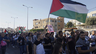 Israeli Arabs take to street to mark Palestinian armed uprising