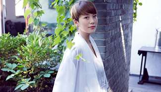 Hai Qing covers fashion magazine