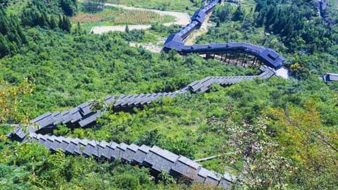 World's longest sightseeing escalator takes tourists down a mountain in China