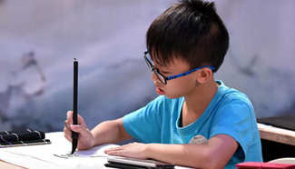 Calligraphy contest for youths and children held in Guangzhou
