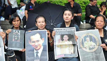 Thai citizens pay respect to late King Bhumibol Adulyadej in Bangkok