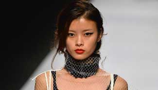 Models present creations during Shanghai Fashion Week