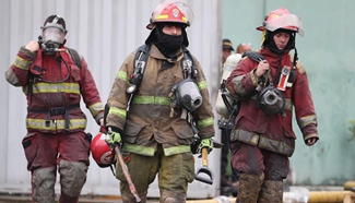 3 firefighters found dead under debris of shoe factory in Lima