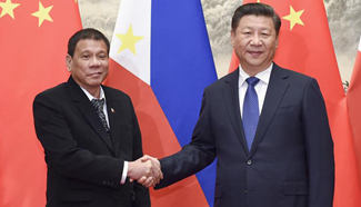 Xi, Duterte agree on full improvement of ties