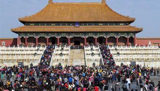 Tourists visit Palace Museum in Beijing