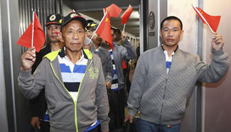 Rescued Chinese return home