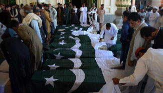 People attend funeral ceremony in SW Pakistan's Quetta