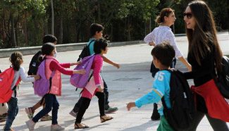 Young refugee children go to school in Athens, Greece