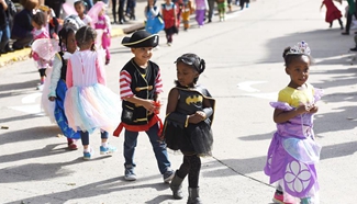 Students attend Halloween parade at elementary school in Virginia, U.S.