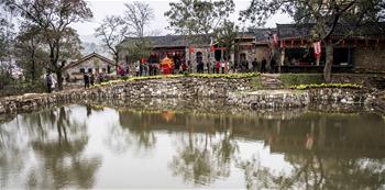 C China's impoverished village becomes tourist destination