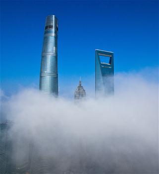 Skyscrapers shrouded by cloud and mist in Shanghai