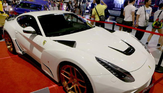 People visit Manila Auto Salon and Sport Truck Show in Pasay City