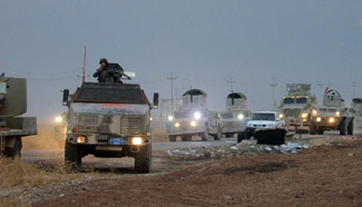 Kurdish forces free town from IS militants near Iraq's Mosul