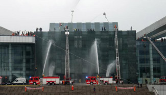 Drill held to mark National Fire Fighting Publicizing Day in C China