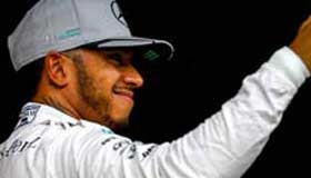Lewis Hamilton takes Formula One pole in Brazil
