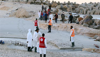 Members of Libyan Red Crescent work in Maya area