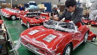 In pics: toy export soars in SE China's Jinjiang City