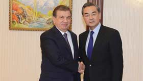 Chinese FM visits Uzbekistan; travels on to Turkey