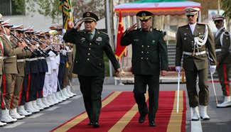 China, Iran pledge to deepen military exchange