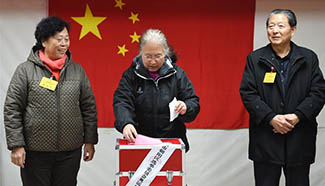 People vote in local legislative elections in Beijing