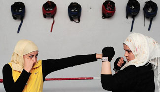 Syrian women boxers exercise in Damascus