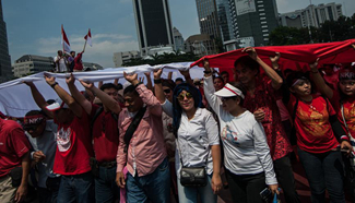 People attend Bhinneka Tunggal Ika Parade in Jakarta, Indonesia