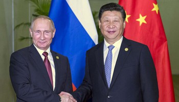 Xi, Putin meet on Asia-Pacific free trade, China-Russia ties