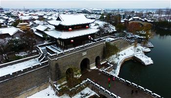 Aerial photos of snow-covered cities across China