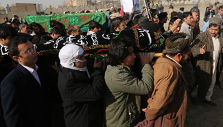 Relatives offer funeral prayers for victims of attack in Kabul