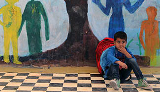 In pics: daily life of children in Greece's refugee camp