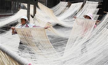 Villagers make noodles in China's Taiwan