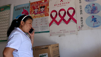 Doctor devotes to AIDS control at border village in SW China's Yunnan