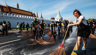 People take part in mass cleaning campaign outside Grand Palace