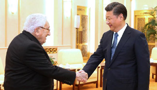 President Xi Jinping meets Henry Kissinger